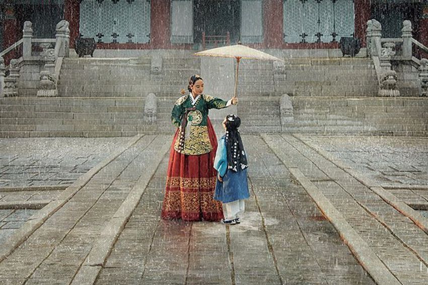 Under the queen's umbrella